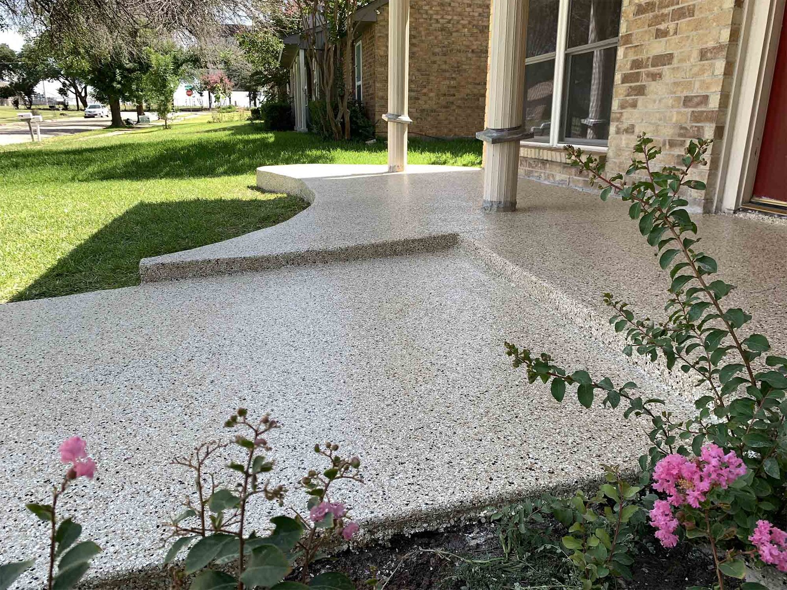 Freshly coated tan entry floor installed by Classic Concrete Coatings