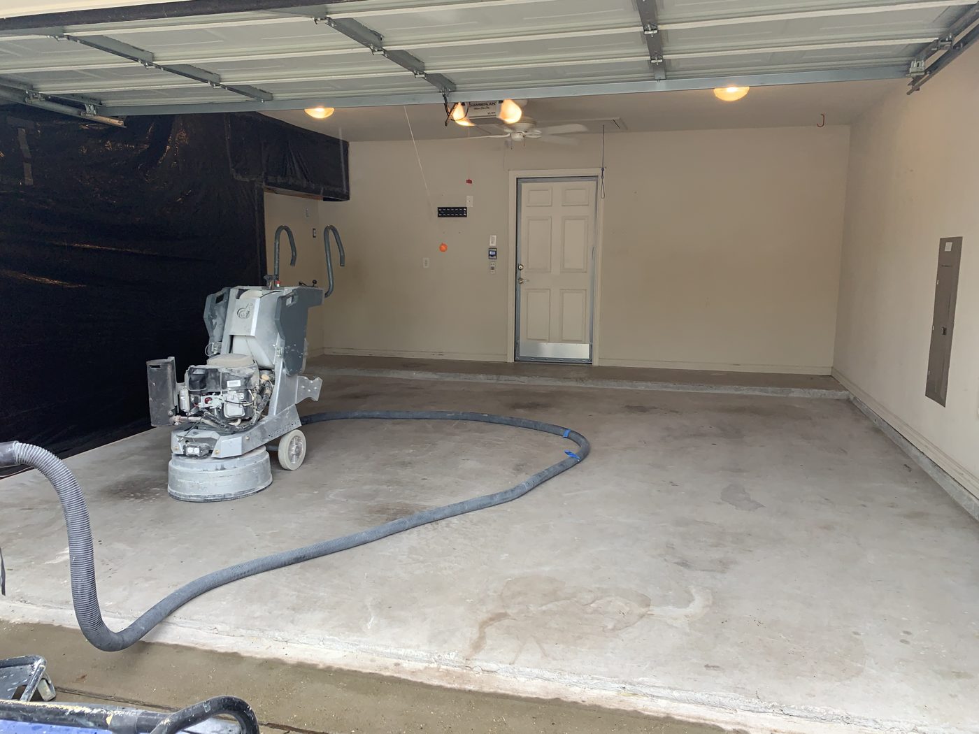 Classic installer diamond grinding concrete before coating